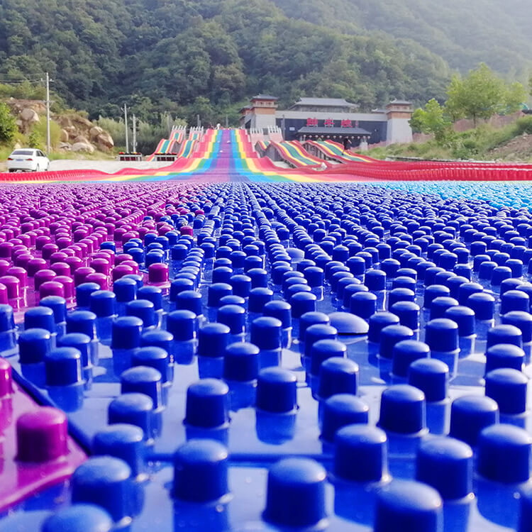 旱滑彩虹滑梯四季滑雪七彩旱雪滑道彩虹滑道滑草游乐设备厂家设计